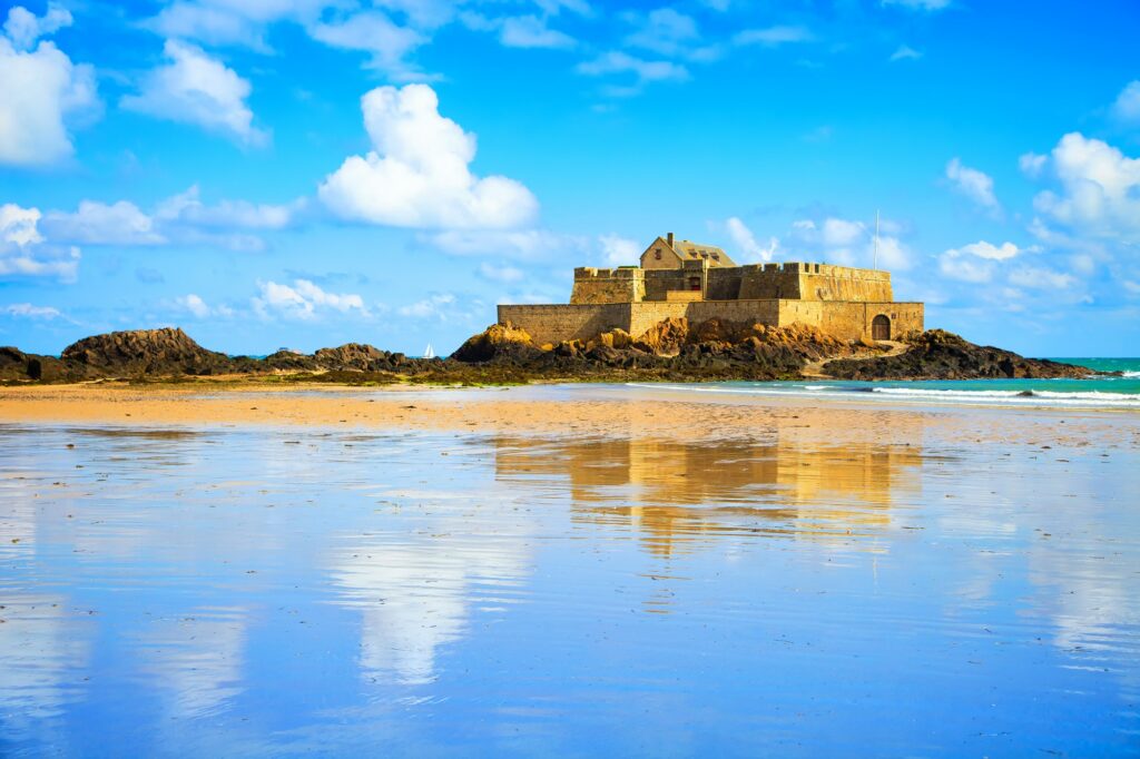 Saint Malo Fort National and beach, low tide. Brittany, France.